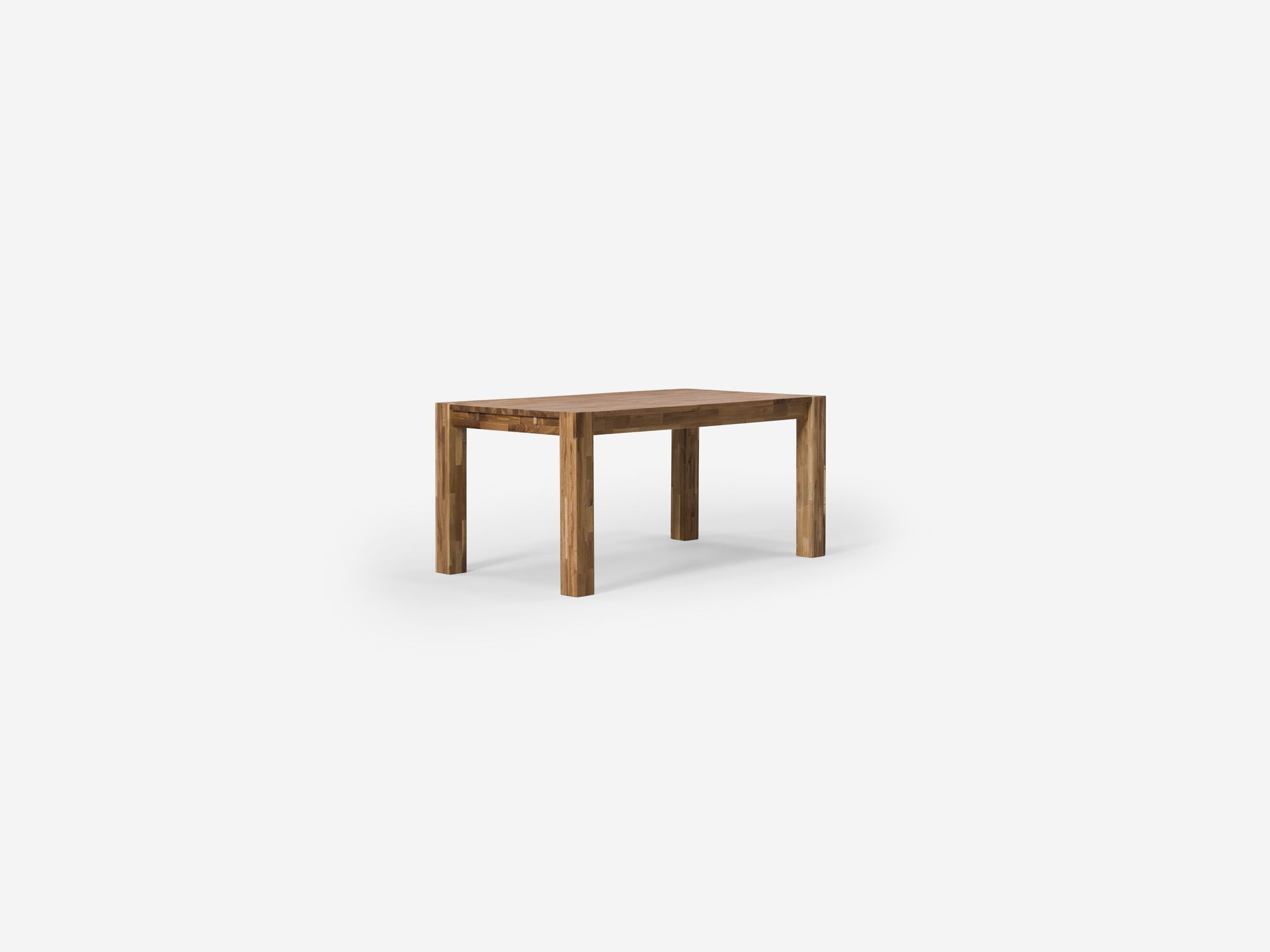 Angled view of the small oak Harvest modern rustic dining table